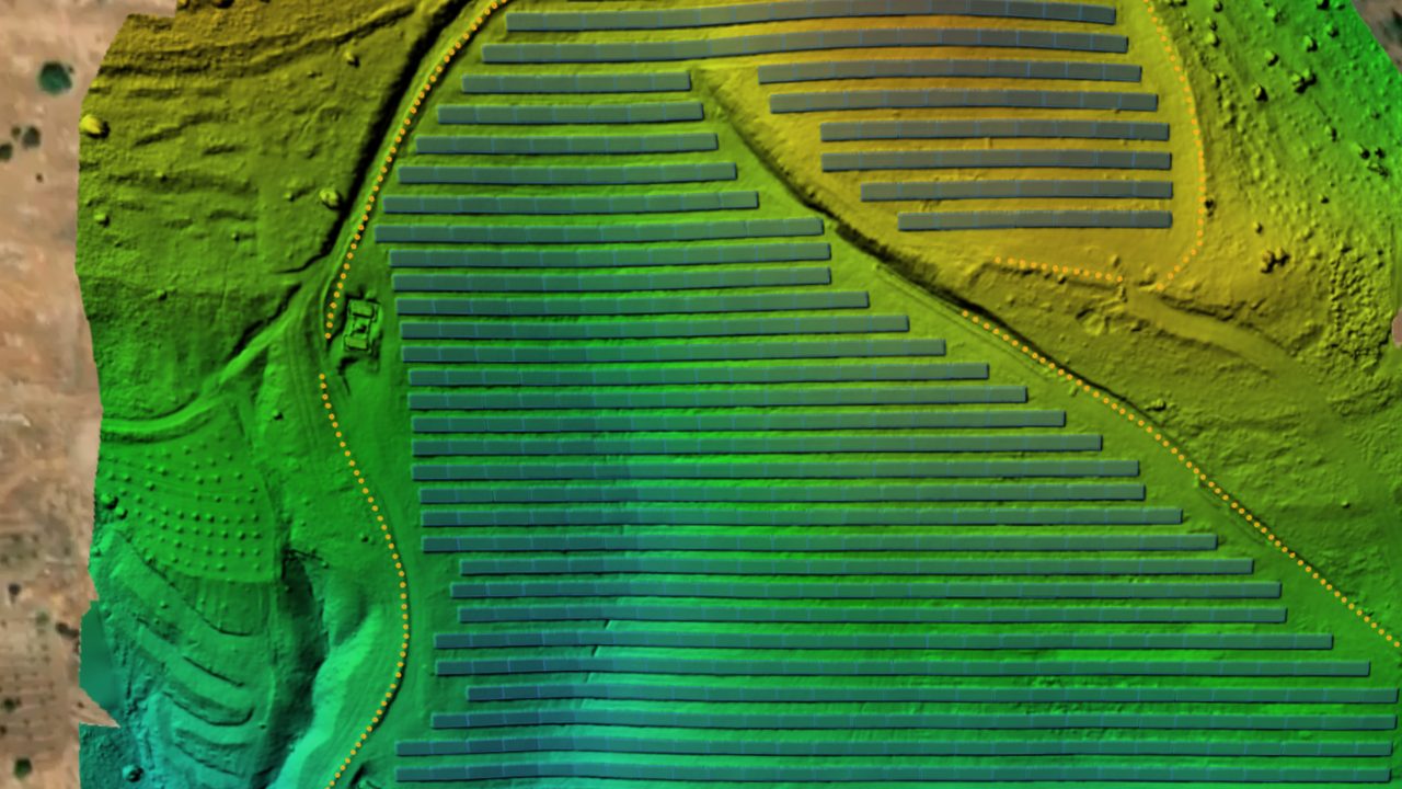 Digital surface model of a solar plant, with elevation shown as colour across the tracker rows and terrain
